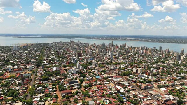 Panoramic view of Posadas city in Misiones, Argentina, with the Paran&aacute; River and the city of Encarnaci&oacute;n, Paraguay, in the background.