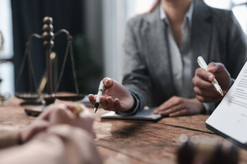 Lawyers discussing contract details during meeting in office