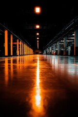 Fototapeta premium Illuminated Warehouse Corridor Reflecting Light On Wet Floor