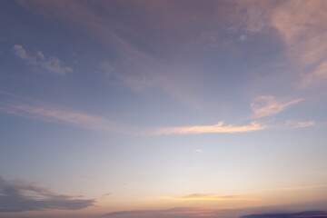 Beautiful morning or evening blue and orange sky with cloudy while sunsets or sunrises taken at the sea used as natural blackground texture