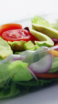 Fresh vegetables in plastic container