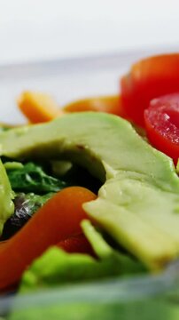 Fresh vegetables in plastic container