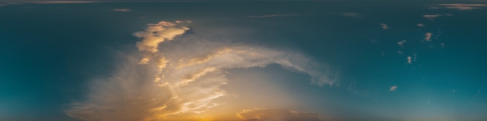 360 panorama of glowing sunset sky with bright Cirrus clouds. Seamless hdr spherical 360 panorama. Sky dome in 3D visualization, sky replacement for aerial drone panoramas. Weather and climate change