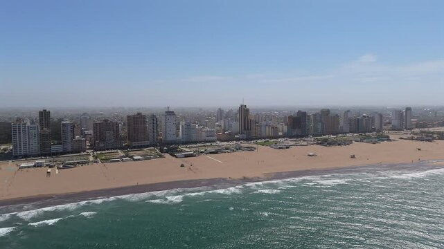 Drone Perspective of Necochea Coastline with extensive Beaches and Modern Cityscape, Argentina