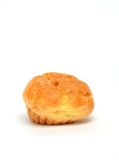 Close up of cream puffs isolated on white background.Food industry concept.Copy space.Crispy skin cream puffs filled with cream from a mixture of butter and wheat flour.For graphic design or banner ba