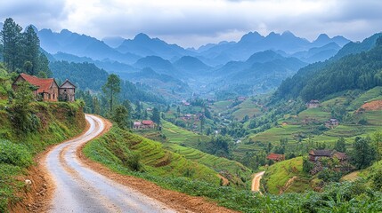 Fototapeta premium Winding mountain road, village, valley, mist, travel