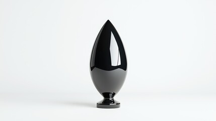 Fototapeta premium Black teardrop sculpture on white background