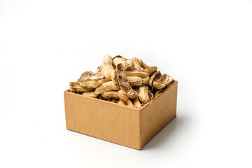 Pile the peanut shells in a container