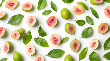 Fototapeta premium Pink guava halves and leaves arranged on white background