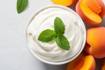 Delightful creamy yogurt paired with ripe peaches and fresh mint leaves. Generative AI