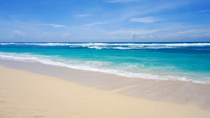Melasti Beach is beautiful with white sand and blue sea water