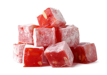Colorful red fruit candy cubes stacked on a white background display playful sweetness and texture