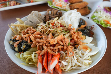 spicy papaya with black crab Thailand called farmer crab and fresh shrimp that is famous of Thailand