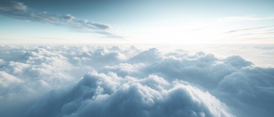 Obraz premium Aerial view of a vast cloudscape with soft light and blue sky creating a serene atmosphere