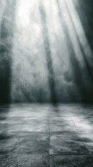 Fototapeta premium Dramatic light rays pierce through smoke over a textured concrete floor in a dark setting