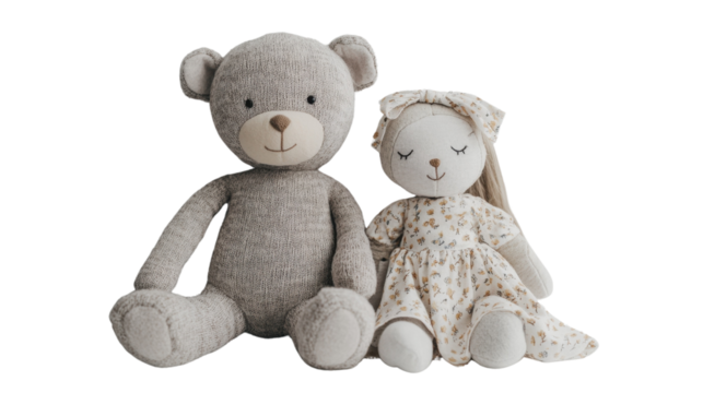 Two fluffy teddy bears sitting with a heart-shaped plush gift