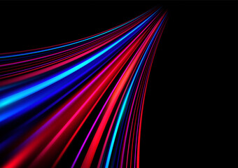 Dynamic motion light trails on dark background.