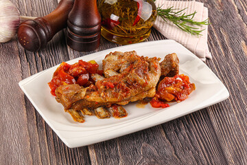 Baked lamb ribs with vegetables