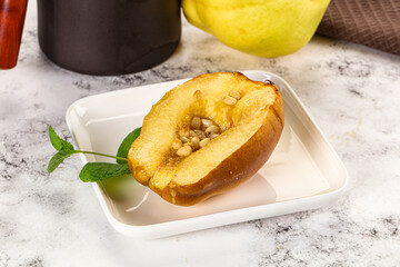 Baked quince with honey and cedar