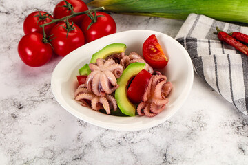 Salad with baby octopus and avocado