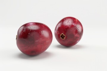Three Cranberries on a white background. Close-up. Isolated.