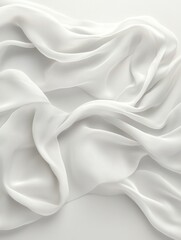 Elegant white fabric draped softly on surface.