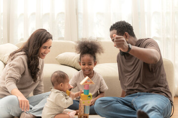 Parents and children relax during their holiday at home