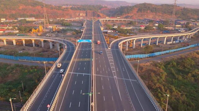 Drone shot highway interchange with many lanes and traffic