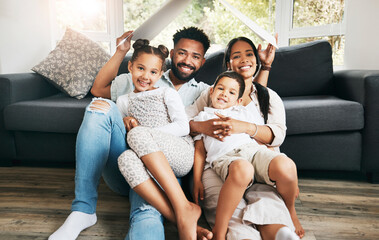 Portrait, house insurance or happy family with cardboard roof for security protection or property investment. Kids, parents or siblings with shelter cover for mortgage loan, support or future care