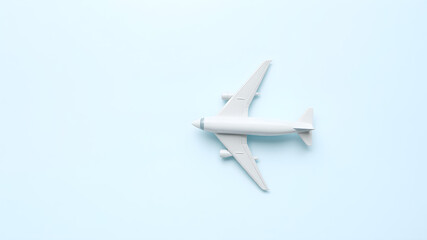 Model plane, airplane on pastel color background.Flat lay design. Generative AI