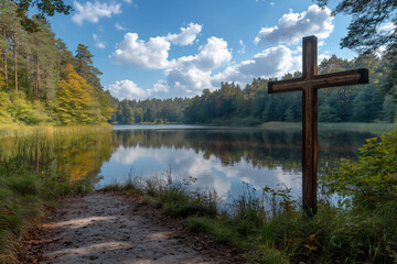  cross by a quiet forest lake