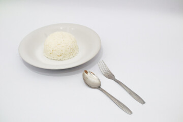 Simple White Rice Dish With Spoon And Fork