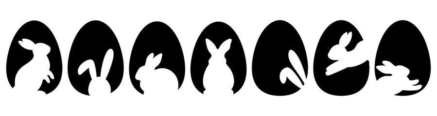 Set with black eggs and bunny silhouettes. Easter egg shape with bunny silhouette - traditional symbol of holiday. Easter rabbit inside egg.