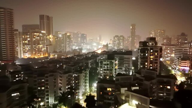 Drone shot Mumbai city skyline glows the tower buildings