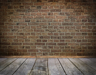 Old bricks wall and wooden floor background with vignette effect.