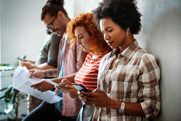 Young business people, engineers, managers working with new startup project in modern office