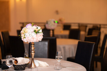 Luxury, elegant wedding reception table arrangement, floral centerpiece