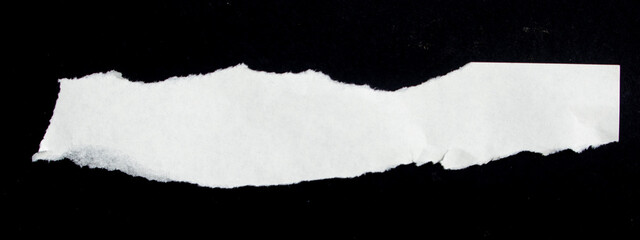 White Torn Paper on Black Background