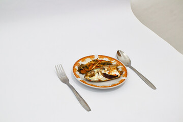 Steamed Fish with Stir Fried Bitter Melon on a Plate