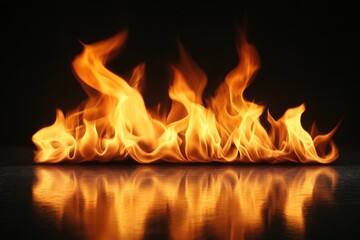 Fototapeta premium Flames dance and flicker against a dark background reflecting their vibrant colors
