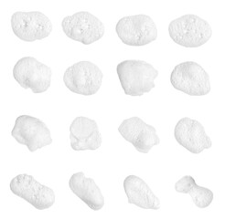
Set of white soap bubbles, shampoo or shower gel, isolated on white background. Textured and contrasting background. Soap bubbles in the bath, shaving cream gel, bubble bath.