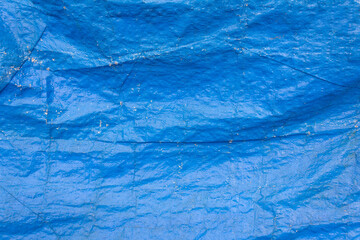 Textured Blue Tarpaulin with Wrinkles and Folds