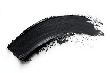 Black paint stroke spreads across a white surface creating a bold artistic expression in modern design
