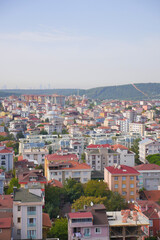 Obraz premium Vibrant cityscape showcasing residential buildings at dusk in Istanbul