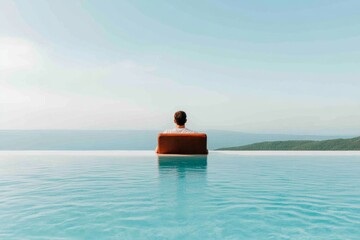 Fototapeta premium Tranquil Nomad Experience Man Video Conferencing by Infinity Pool in Tropical Resort Luxury Workspace and Modern Digital Nomad Lifestyle Promotion