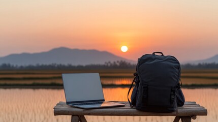 Digital Nomads Rustic Workspace Bamboo Chair, Laptop, and Backpack Overlooking Kerala Rice Paddies - Modern Work Flexibility and Eco-Friendly Design for Remote Professionals