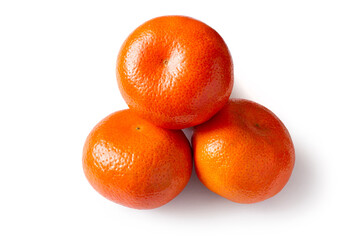 A bunch of ripe tangerines on a white background. Tangerines close-up with shadow.