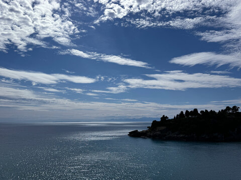 Sea blue glittering water, amazing heaven and scenic rocky Adriatic coast in Montenegro. 