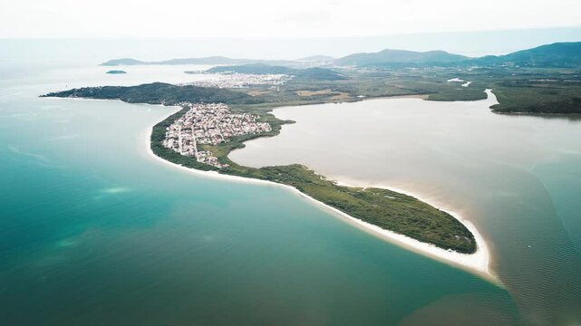 Aerial view of the sandy beach named Daniela located on the north of Santa Catarina island, Florianopolis, Brazil
