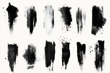 Various black paint strokes on a white background showcasing artistic expression and texture